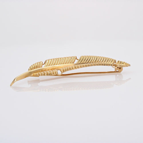 Broche Broche plume or jaune ciselé 58 Facettes CVBR39