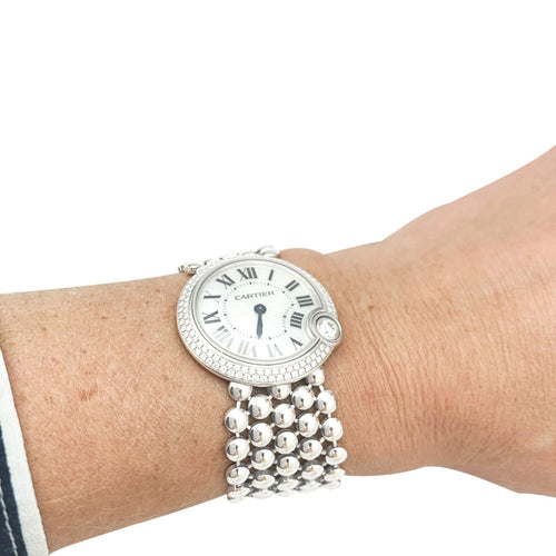 Montre Montre Cartier "Ballon Blanc" en or blanc et diamants. 58 Facettes 31118