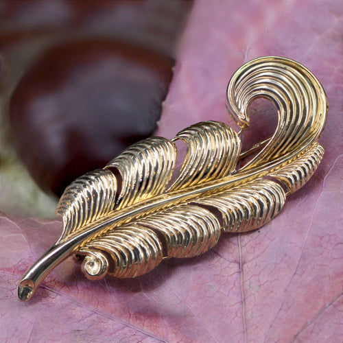 Broche Broche vintage plume en or 58 Facettes 22-417