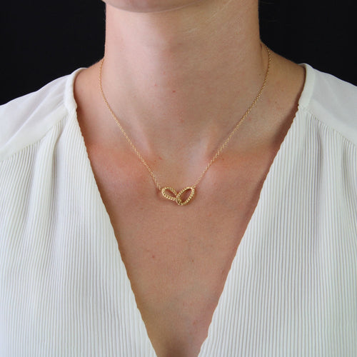 Collier Collier or jaune boucles entrelacées 58 Facettes 23-216