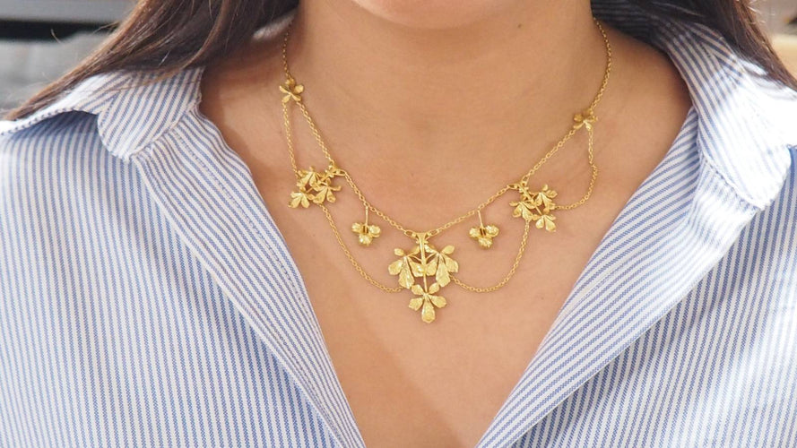 Collier Collier draperie ancien en or jaune 58 Facettes 31302
