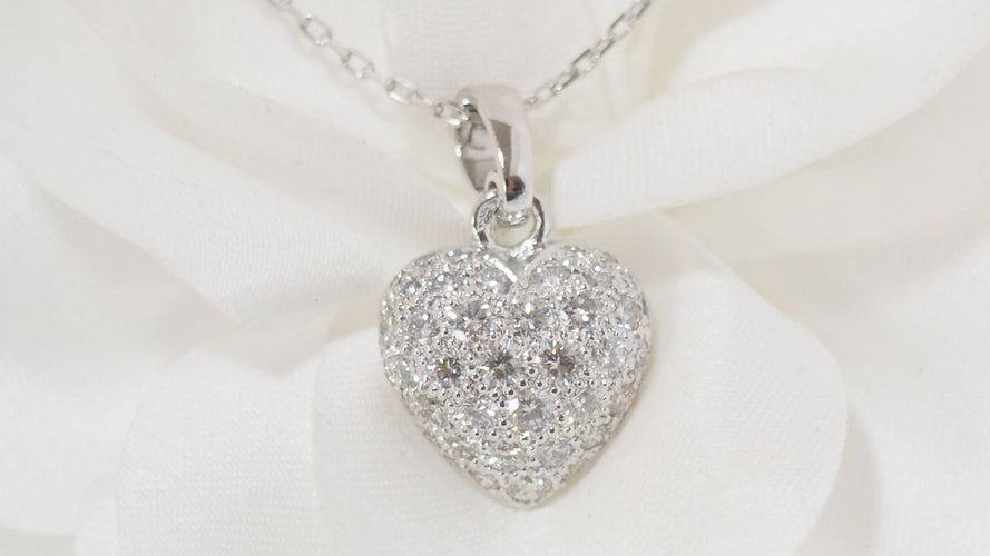 Collier Collier Cartier pendentif cœur, or blanc et diamants 58 Facettes 13807