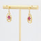 Boucles d'oreilles Pendants d'oreilles rubis d'occasion 58 Facettes 19-456