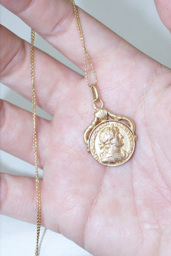 Pendentif Médaille pivotante pièce romaine or 58 Facettes