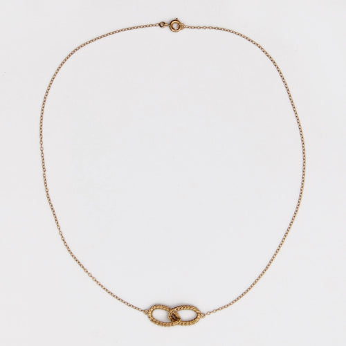 Collier Collier or jaune boucles entrelacées 58 Facettes 23-216