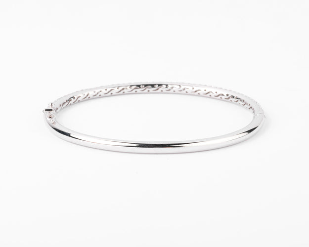 Bracelet Bracelet jonc en or gris serti de 3 lignes de diamant 58 Facettes