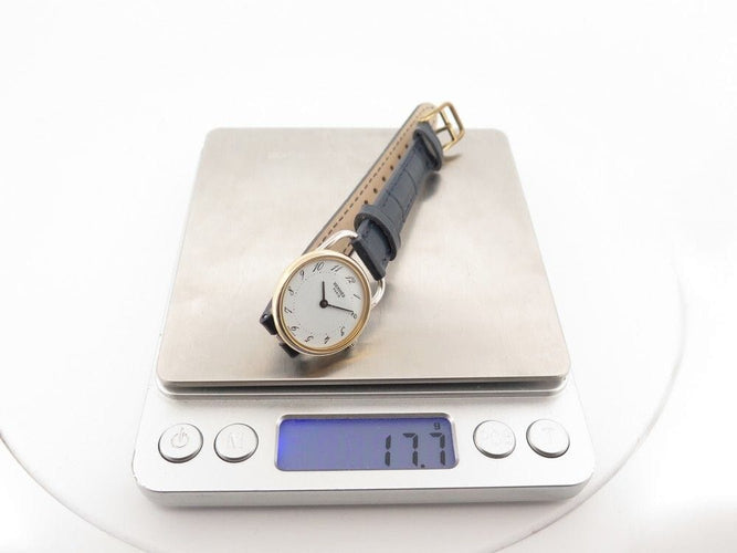 Montre vintage montre HERMES arceau 25mm plaque or bracelet cuir crocodile quartz 58 Facettes 256219