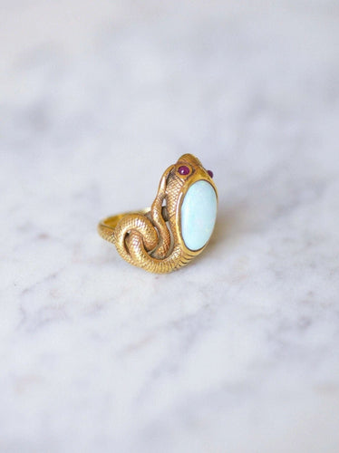 Bague serpent enroulé vintage en or jaune, opale, et rubis 58 Facettes