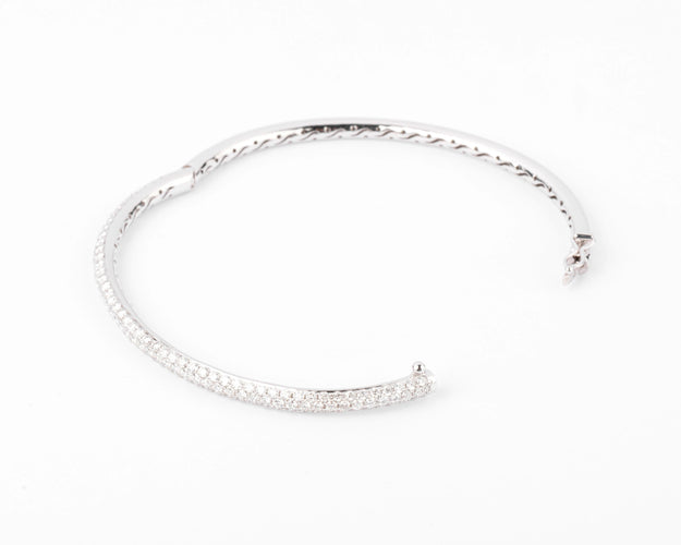 Bracelet Bracelet jonc en or gris serti de 3 lignes de diamant 58 Facettes