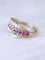 Bague Bague bandeau vintage en or gris, rubis, et diamants 58 Facettes