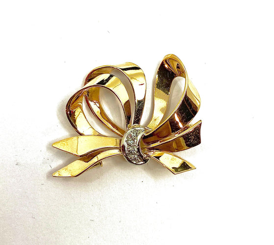 Broche Broche noeud diamants 58 Facettes