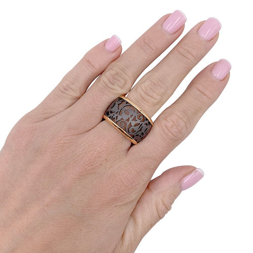 Bague 54 Bague Pomellato, "Arabesque", or rose, titane. 58 Facettes 32313