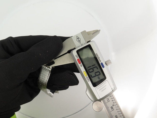 Montre vintage montre EBEL carre en or blanc 18k et diamants 0.4ct mecanique 58 Facettes 250142