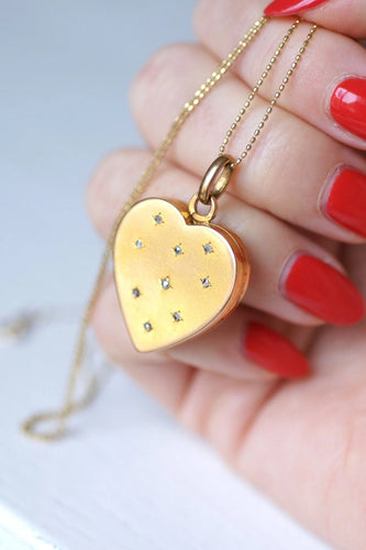 Pendentif Pendentif médaillon ancien cœur ouvrant en or et diamants taille rose 58 Facettes