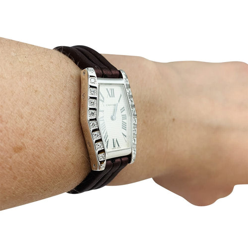 Montre Montre Cartier "Lanière" en or blanc et diamants, bracelet cuir. 58 Facettes 30252
