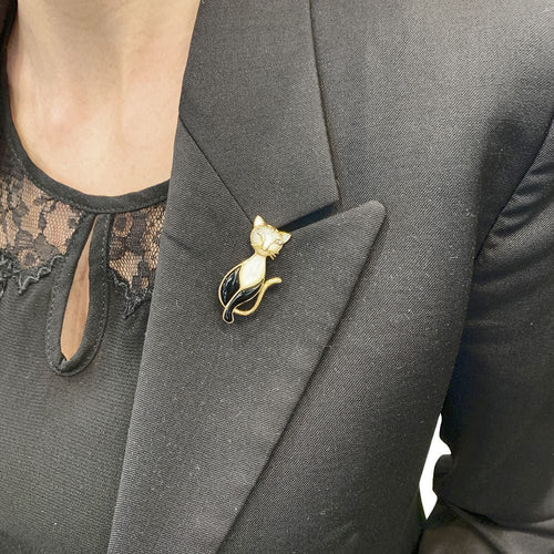 Broche Broche "Chat", or jaune, nacre, onyx, diamants. 58 Facettes 32695