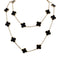 Collier Sautoir Van Cleef & Arpels, "Vintage Alhambra", or jaune, onyx. 58 Facettes 32128