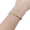 Bracelet Bracelet Poiray, "Tresse", trois tons d'or. 58 Facettes 33309