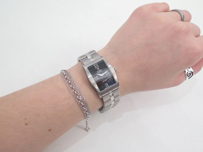 Montre montre TUDOR archeo 30210 tonneau acier femme 30 mm quartz 58 Facettes 193239