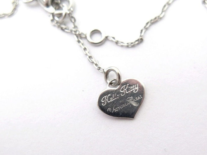Collier collier VICTORIA CASAL pendentif hello kitty en or blanc 18k diamants 58 Facettes 253448