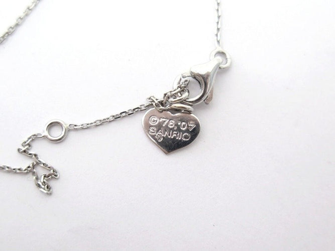 Collier collier VICTORIA CASAL pendentif hello kitty en or blanc 18k diamants 58 Facettes 253448