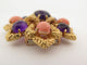 Broche broche pendentif VAN CLEEF & ARPELS delphes 1975 or cabochons corail & amethyste 58 Facettes 257359