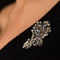 Broche Broche bouquet saphirs diamants 58 Facettes 19-564