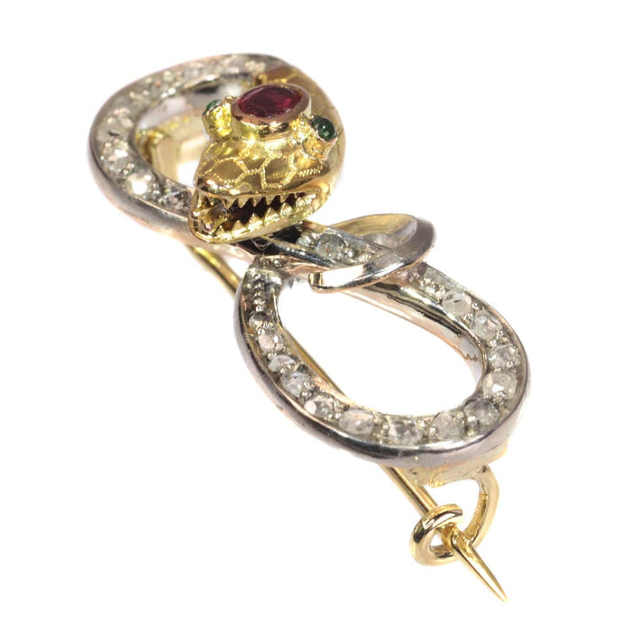 Broche Broche serpent en or, diamants 58 Facettes 19196-0143
