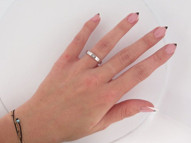 Bague 54 vintage bague CARTIER tank solitaire en or 18k diamant princesse 0.25ct 58 Facettes 257979