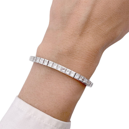 Bracelet Bracelet ligne or blanc et diamants taille princesse. 58 Facettes 32893
