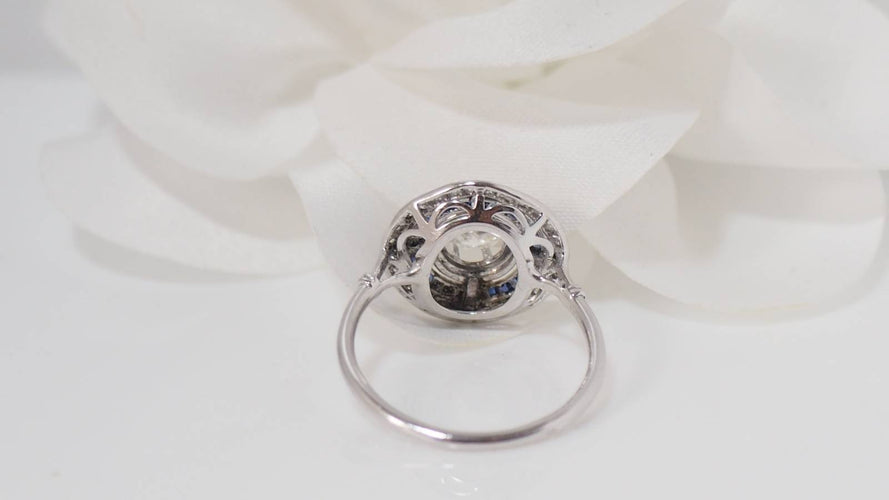 Bague Bague double entourage Art Déco platine, saphirs calibrés et diamants 58 Facettes