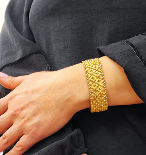 Bracelet Bracelet manchette or jaune Années 60 58 Facettes RA-94