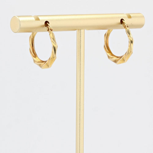 Boucles d'oreilles Créoles or jaune torsadées 58 Facettes 19-456D