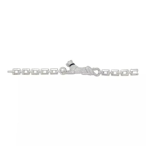 Bracelet Bracelet Cartier "Panthère de Cartier" en or blanc, diamants, émeraude et onyx. 58 Facettes 31544