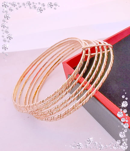 Bracelet Bracelet Semainier Joncs ciselés Or Rose 58 Facettes AA 1477