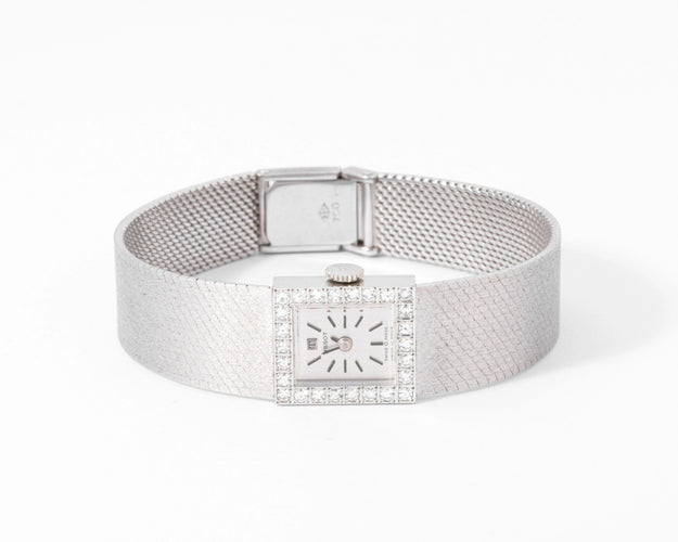 Montre Montre Tissot or gris et diamant 58 Facettes 0