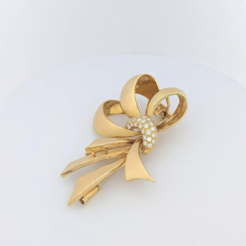 Broche Broche en or jaune et diamants 58 Facettes 25564