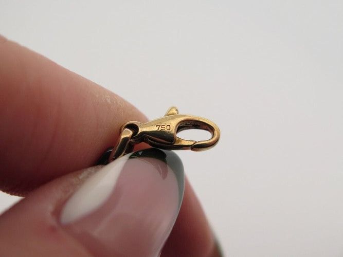 Bracelet vintage bracelet CARTIER a maillons 19 or jaune 18k hematite 58 Facettes 258414