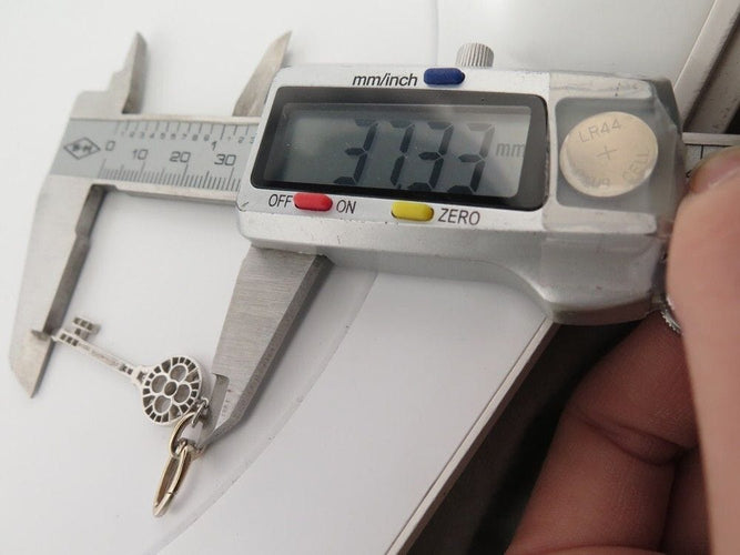 Collier collier pendentif TIFFANY & CO cle rosace platine diamants 58 Facettes 248507