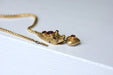 Collier Collier serpent ancien en or jaune et grenat 58 Facettes