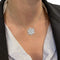 Pendentif Pendentif Poiray "Flower" en or blanc et diamants. 58 Facettes 31065