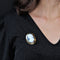 Broche Broche ancienne camée sur cornaline et émail 58 Facettes 21-837