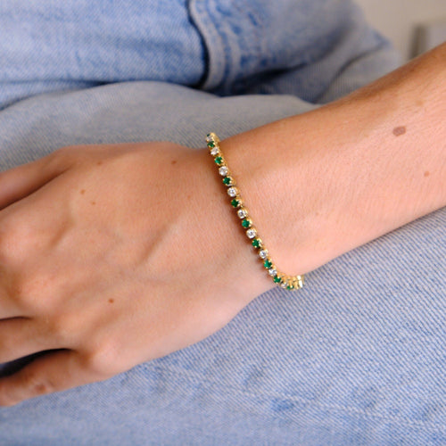 Bracelet BRACELET RIVIERE EMERAUDES ET DIAMANTS OR JAUNE 58 Facettes