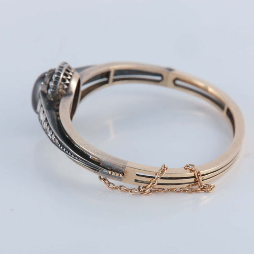 Bracelet Bracelet avec un grenat cabochon, or et argent 58 Facettes