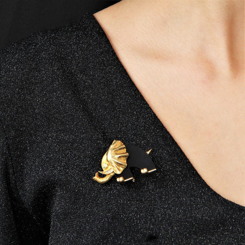 Broche Broche éléphant or onyx diamants émeraude 58 Facettes 21-796