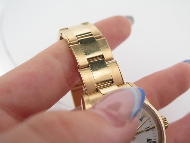 Montre vintage montre ROLEX oyster perpetual 67488 31 mm automatique or jaune 18k 58 Facettes 252911