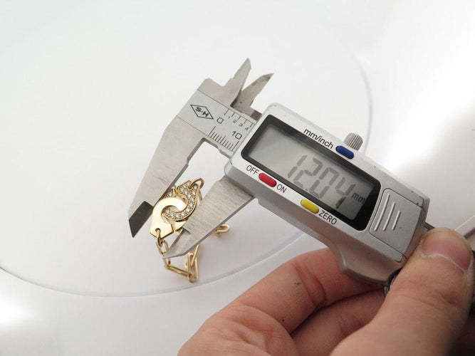 Bracelet bracelet DINH VAN menottes r12 or jaune 18k & diamants 58 Facettes 255762