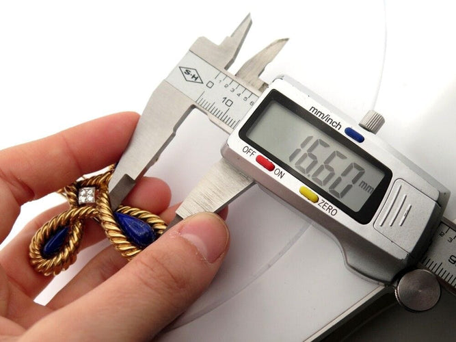 Broche broche VAN CLEEF & ARPELS pendentif croix cabochon lapis lazuli diamants 58 Facettes 257360