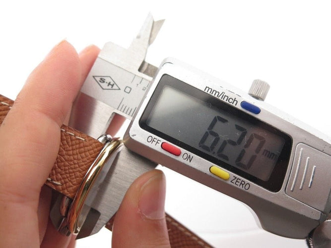 Montre montre HERMES arceau quartz 33 mm or & acier 58 Facettes 254345