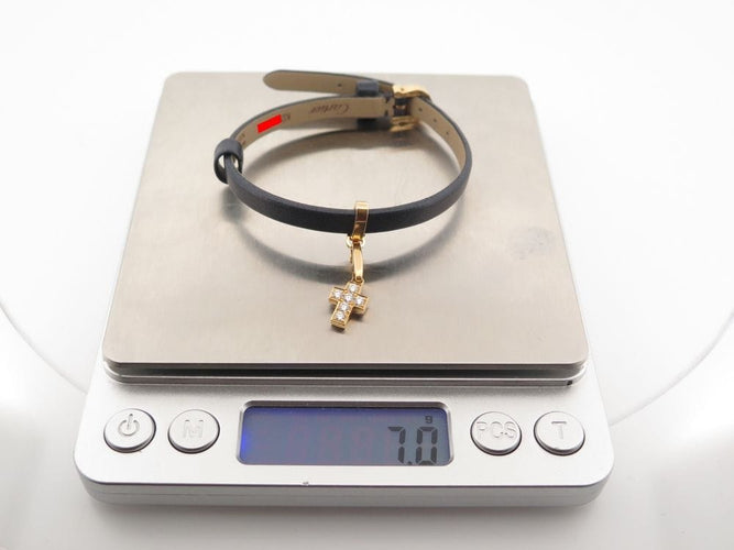 Bracelet bracelet CARTIER breloque croix or jaune 18k 6 diamants 0.36ct 58 Facettes 254652